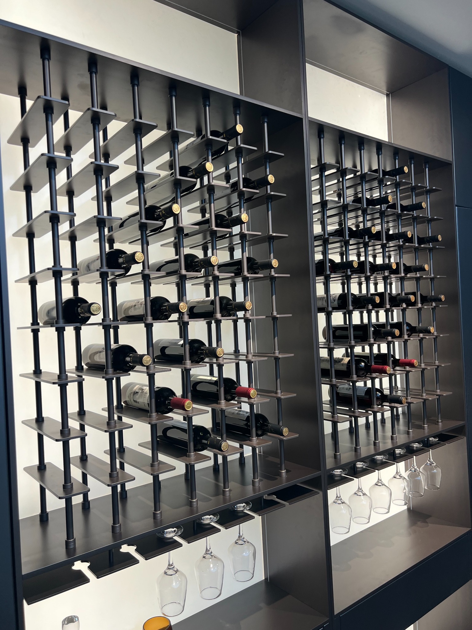 Modular metal wine rack with integrated stemware holders