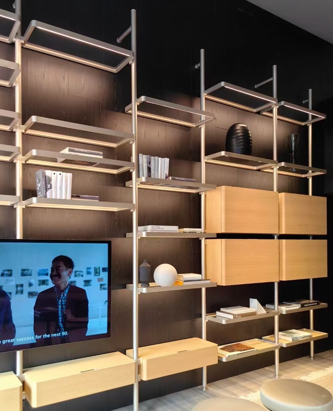 Modular upright shelving configured as a media wall