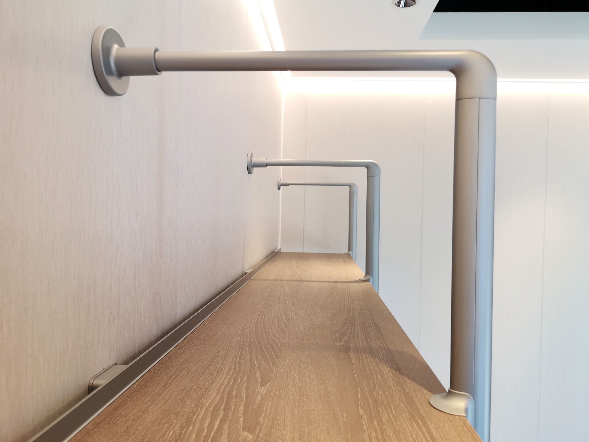 Wall brace detail for a floor-to-ceiling shelving system